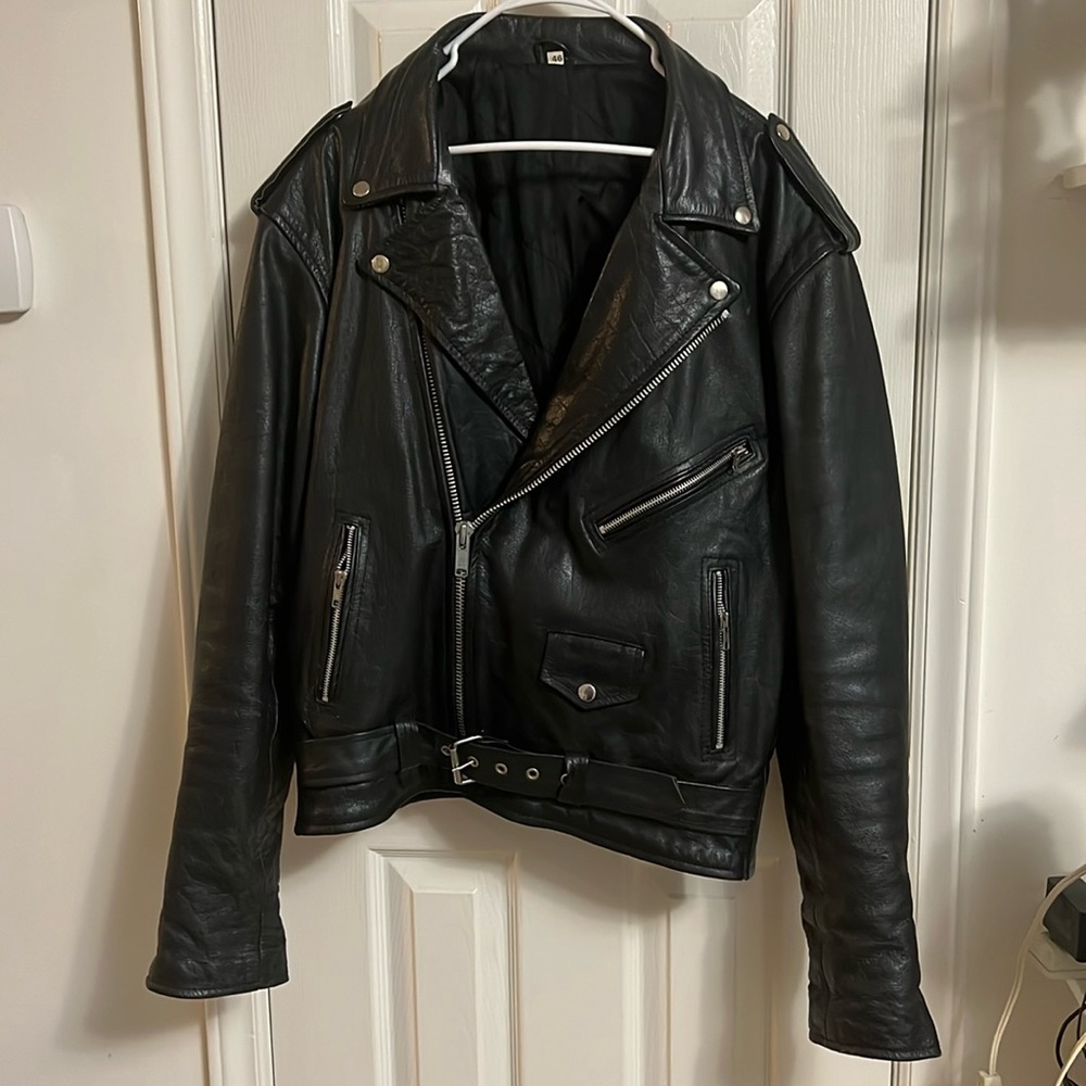 Man leather  jacket unknown brand , preowned jacket but in great condition